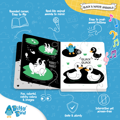 The open Ditty Bird UK "Black & White Animals" book displays dog and duck illustrations, featuring real animal sounds, sturdy rounded pages, and a colorful interactive design to support early learning.
